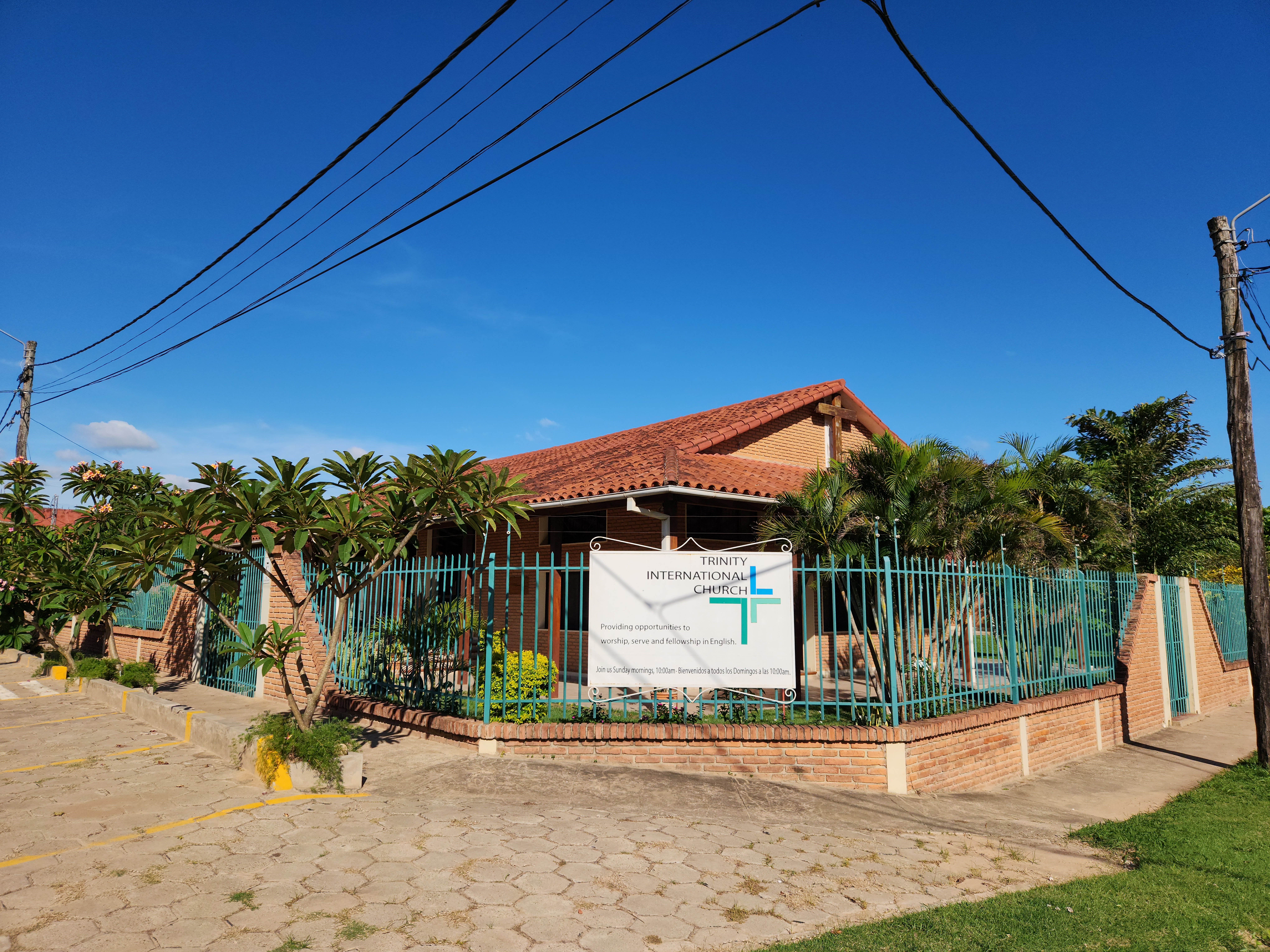 Image of church building with palm trees